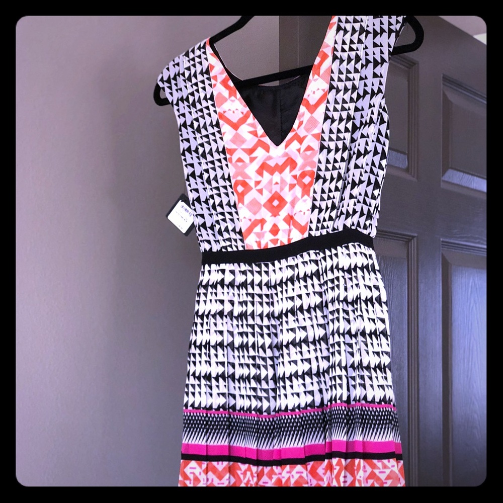 Colorful dress with pleated bottom